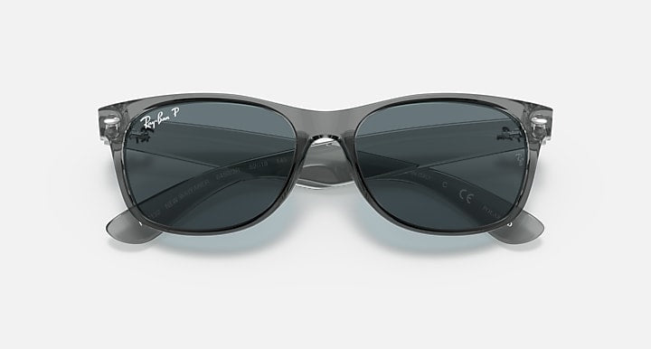 Ray-Ban New Wayfarer sunglasses with dark translucent frame and smoky lenses