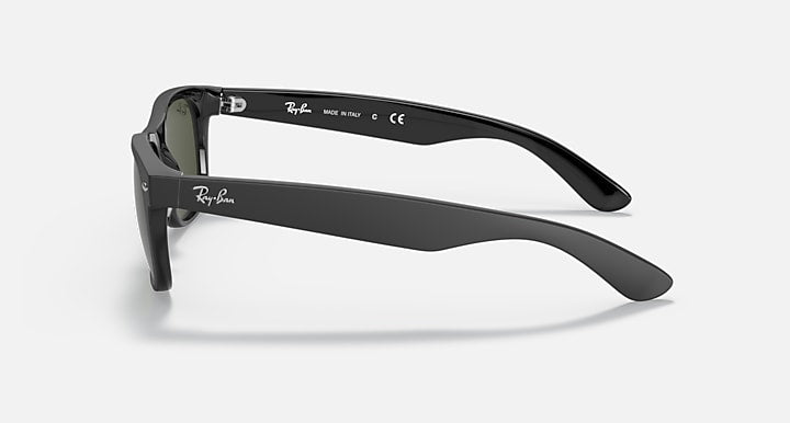 Ray-Ban New Wayfarer RB2132 sunglasses, dark frame with green-tinted lenses, side view.