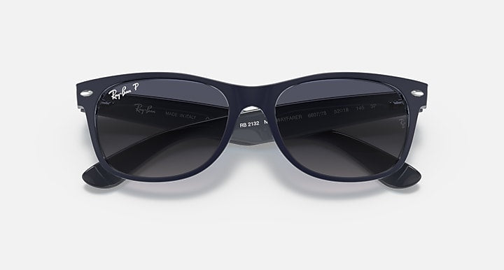 Ray-Ban New Wayfarer sunglasses with dark frame and dark tinted lenses