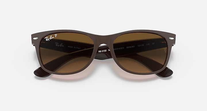 Ray-Ban New Wayfarer RB2132 sunglasses with dark frame and brown gradient lenses