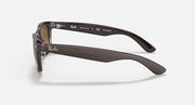 Ray-Ban New Wayfarer RB2132 side-profile sunglasses with dark frame and brown lens