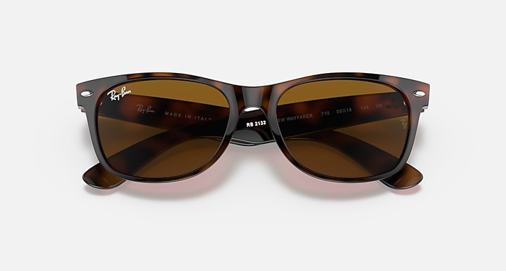 New Wayfarer sunglasses with tortoise frame and dark brown tinted lenses