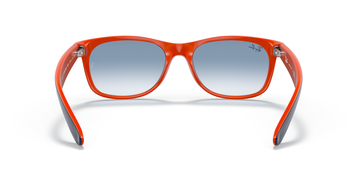 Orange wayfarer-style sunglasses with blue gradient lenses and full rim frame