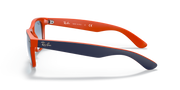 Orange wayfarer sunglasses shown from the side with blue-tinted lenses