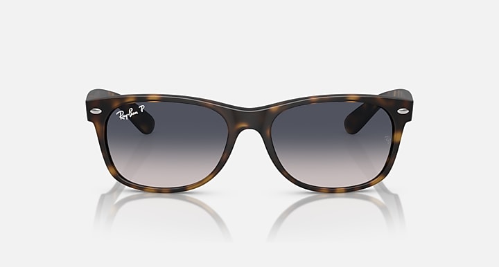 Ray-Ban RB2132 Wayfarer sunglasses, tortoise frame, dark lenses, front side view