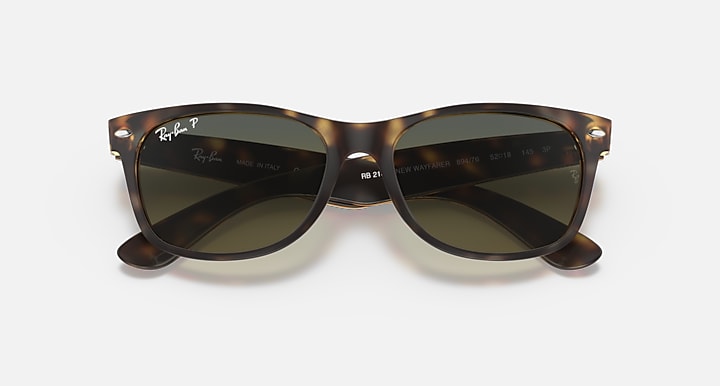 Ray-Ban sunglasses with tortoise frame and dark smoke lenses, wide Wayfarer style