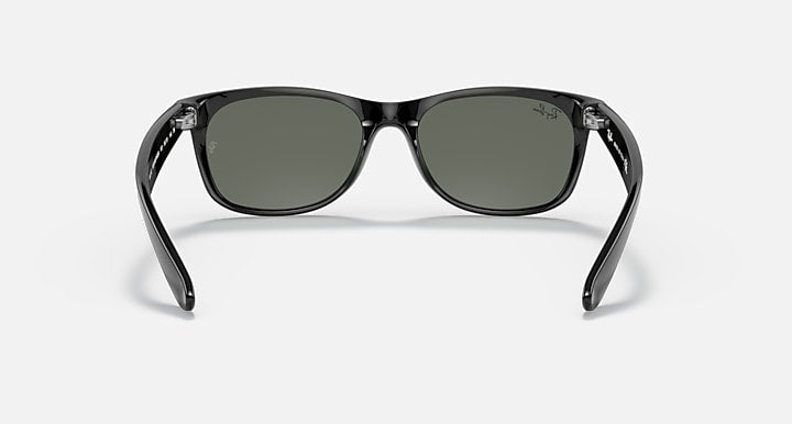 Ray-Ban Wayfarer RB2132 sunglasses, black frame, dark green lenses, straight-on