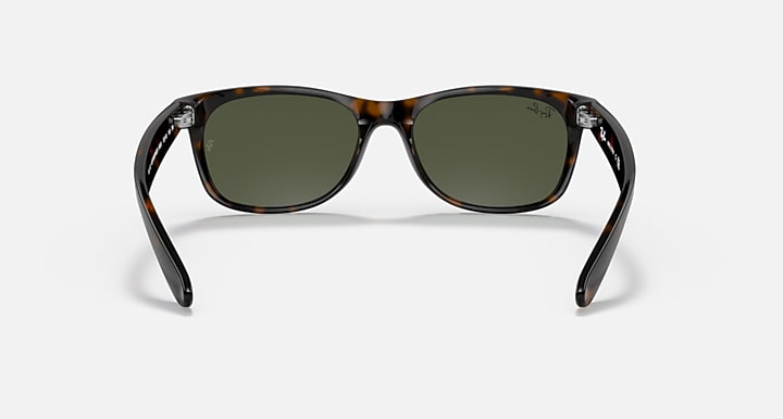 Ray-Ban Wayfarer RB2132 sunglasses, tortoise frame, dark green lenses, front view