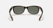 Wayfarer RB2132 sunglasses with tortoise frames and muted green lenses