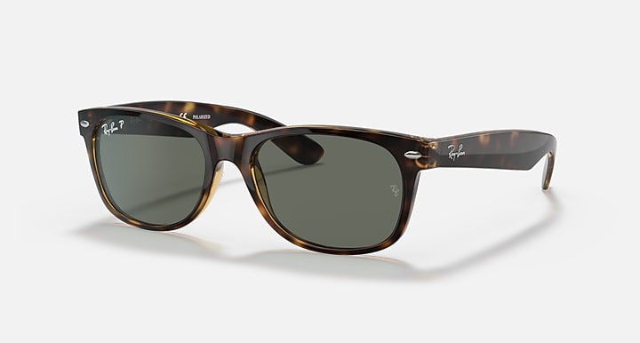 Wayfarer RB2132 sunglasses with tortoise frames and dark lenses