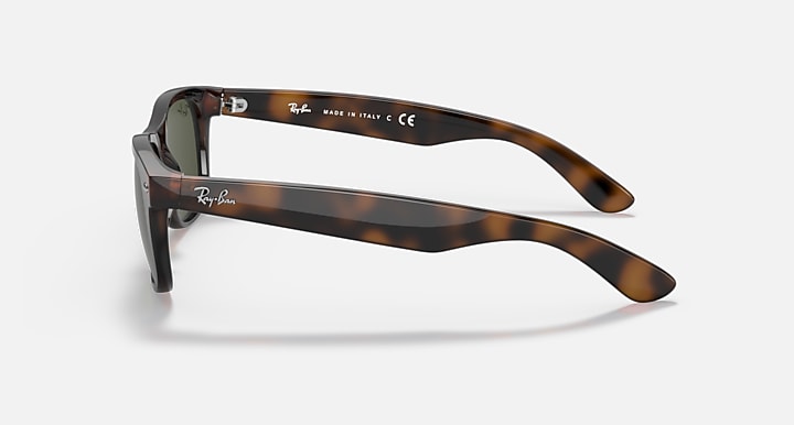 New Wayfarer sunglasses side view, tortoise frame with dark green lenses