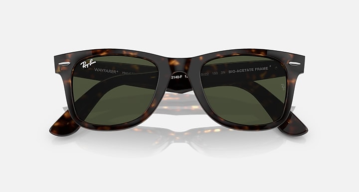 Ray-Ban Wayfarer sunglasses, tortoise frame with dark green lenses, logo on temple