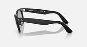 Ray-Ban Wayfarer sunglasses, black frame side profile with light gray lenses