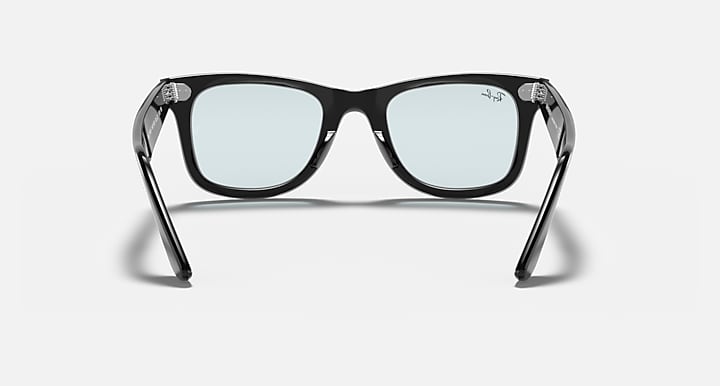 Ray-Ban Wayfarer sunglasses with black frame and light blue lenses, straight-on view.