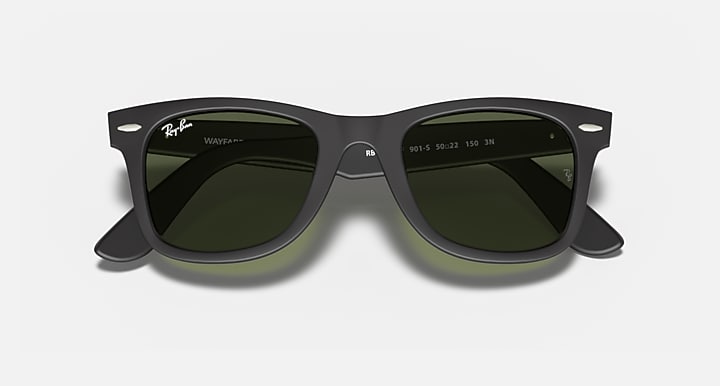 Wayfarer-style sunglasses with dark green lenses and black frame, centered front view