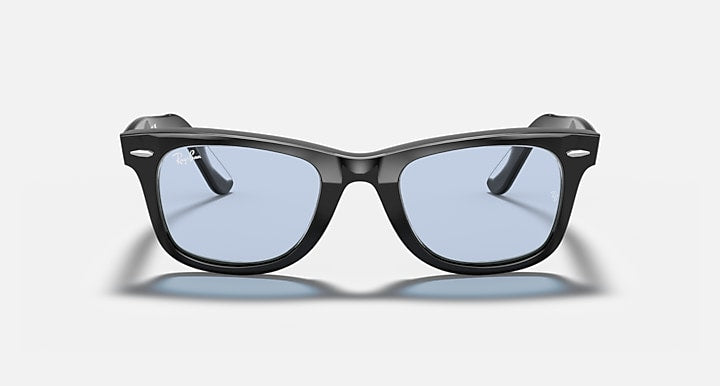Ray-Ban Wayfarer sunglasses, black frame with light blue lenses, front view.