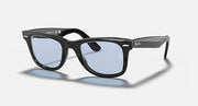 Ray-Ban Wayfarer sunglasses with black frame and light blue lenses, low bridge fit.