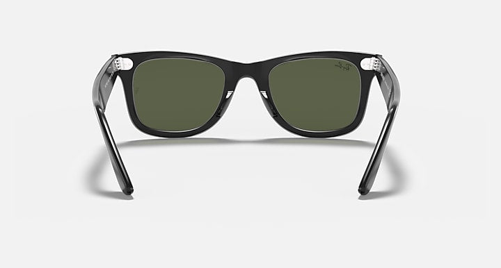 Ray-Ban wayfarer sunglasses with black frame and dark green lenses