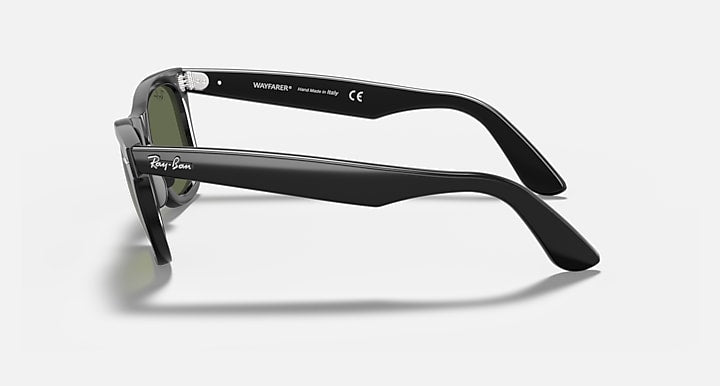 Ray-Ban wayfarer sunglasses, black frame side profile with green tinted lens