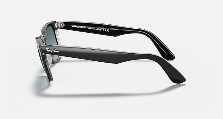 Ray-Ban Original Wayfarer sunglasses with black frame and teal-tinted lenses, side view