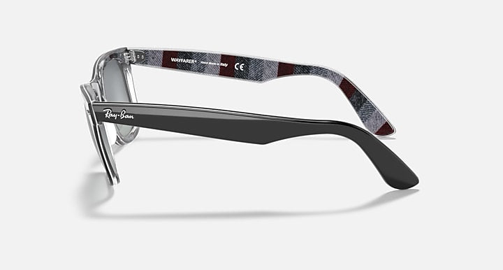 Ray-Ban Wayfarer sunglasses side view with patterned temple and dark gray lenses