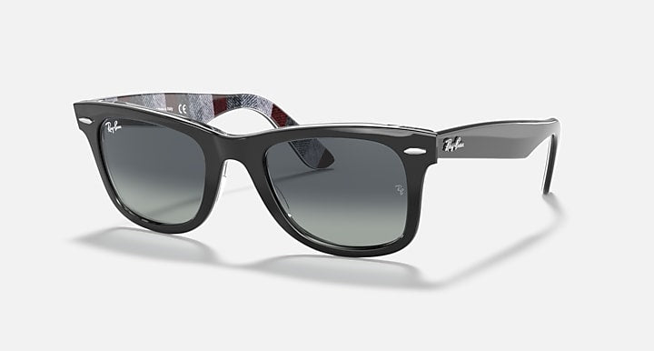Ray-Ban Wayfarer sunglasses with dark lenses and dark frame, slight side angle
