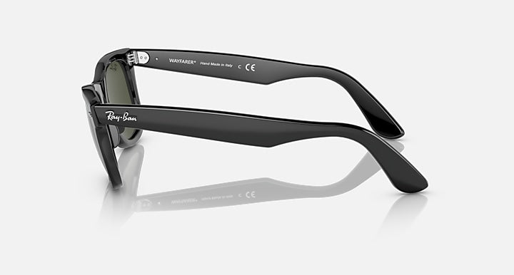 Wayfarer-style sunglasses, black frame with dark lenses and slanted arm