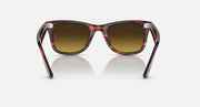 Ray-Ban Wayfarer sunglasses straight-on view, dark amber lenses, red-brown gradient frames