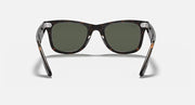 Tortoise Wayfarer sunglasses front view with dark green lenses and thick arms
