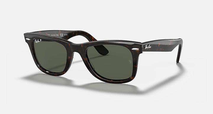 Tortoise Wayfarer-style sunglasses with dark green lenses and clear top frame detail