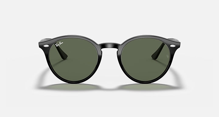 Ray-Ban round sunglasses, black frame with dark green lenses, angled front
