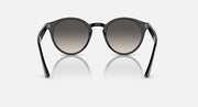 Ray-Ban round sunglasses with black frame and dark tint lenses, angled front