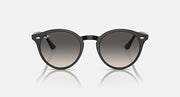 Ray-Ban round sunglasses with dark grey frame and gradient lenses, front view