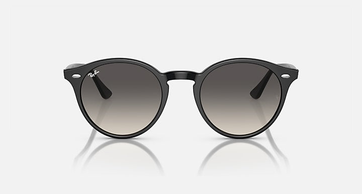 Ray-Ban round sunglasses with dark grey frame and gradient lenses, front view