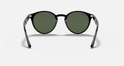 Round sunglasses with clear-dark frame and dark green lenses