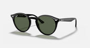 Black round sunglasses with dark green lenses