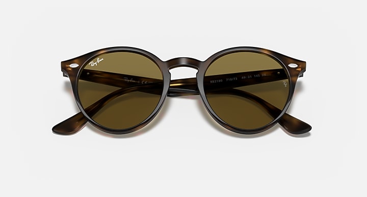 Ray-Ban round sunglasses with dark olive lenses and tortoiseshell frame, front view
