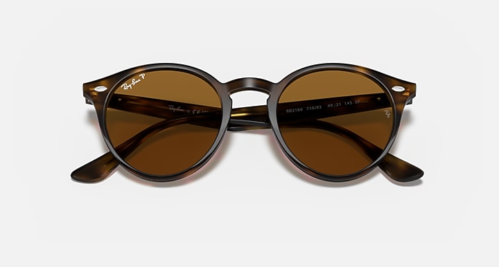Ray-Ban round sunglasses with tortoiseshell frame and brown-olive lenses, front view