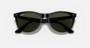 Glossy black wayfarer sunglasses with dark green lenses and center bridge