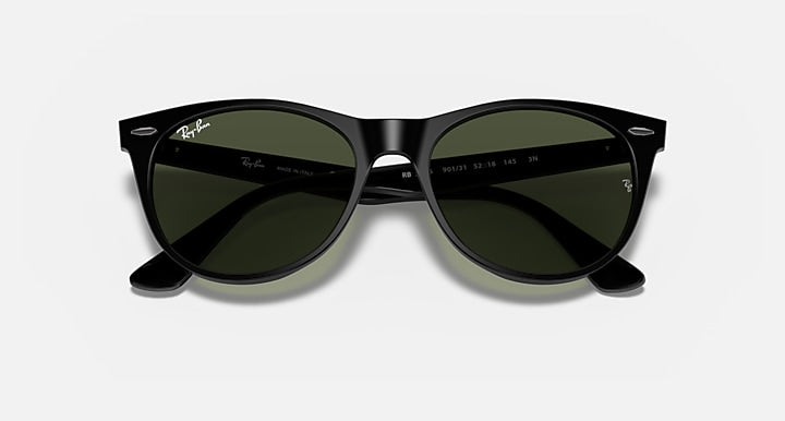 Glossy black wayfarer sunglasses with dark green lenses and center bridge