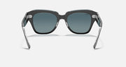 Ray-Ban State Street RB2186 sunglasses front view, clear black frame with blue lenses