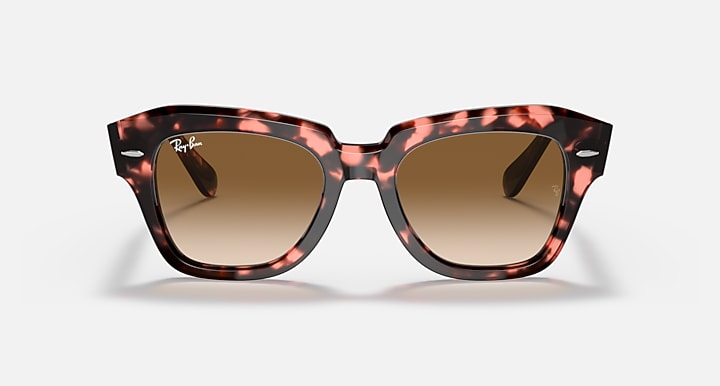 Tortoise square-frame sunglasses with brown lenses, front view.