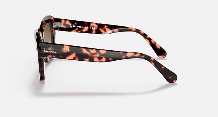 Tortoise square-frame sunglasses, side profile with brown lenses and curved temples.