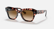 Square-frame tortoise sunglasses with brown gradient lenses and dark temple arms.