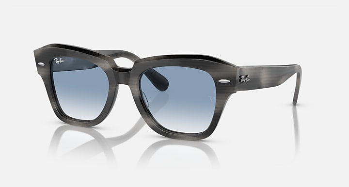 Black sunglasses with blue mirrored lenses and Wayfarer-style frame