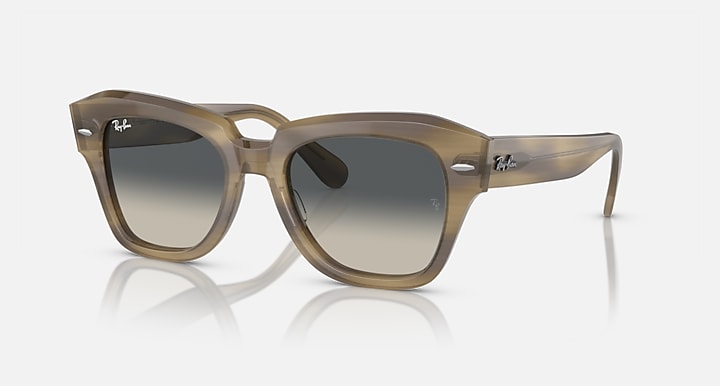 Ray-Ban State Street RB2186 sunglasses with brown translucent frame and dark gradient lenses