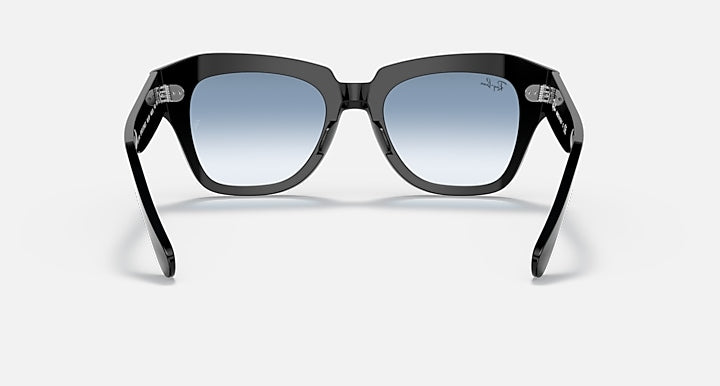 Ray-Ban State Street sunglasses with dark frame and blue gradient lenses