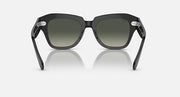 Matte black square-frame sunglasses with dark green lenses, straight-on view.