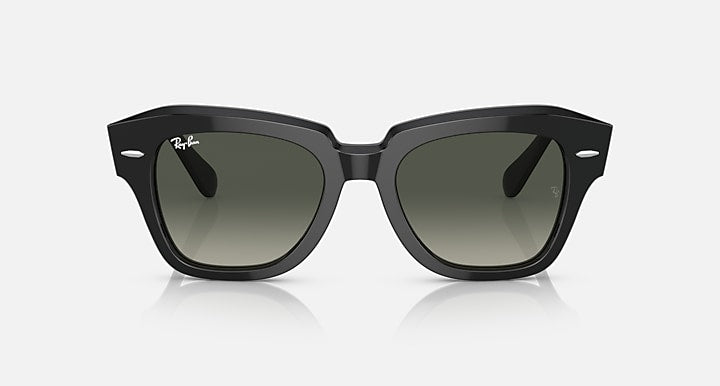 Black square-frame sunglasses with dark green lenses, front view.