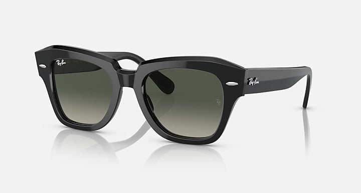 Black square-frame sunglasses with dark green lenses and straight temple arms.